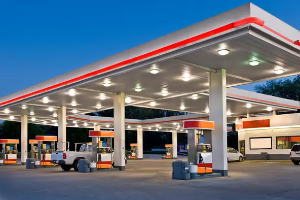 Inspector reviewing paperwork at a fueling facility