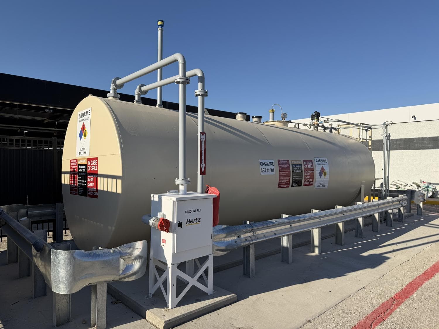Installed gasoline AST, remote fill cabinet and protective barrier at the Dallas rental-car facility