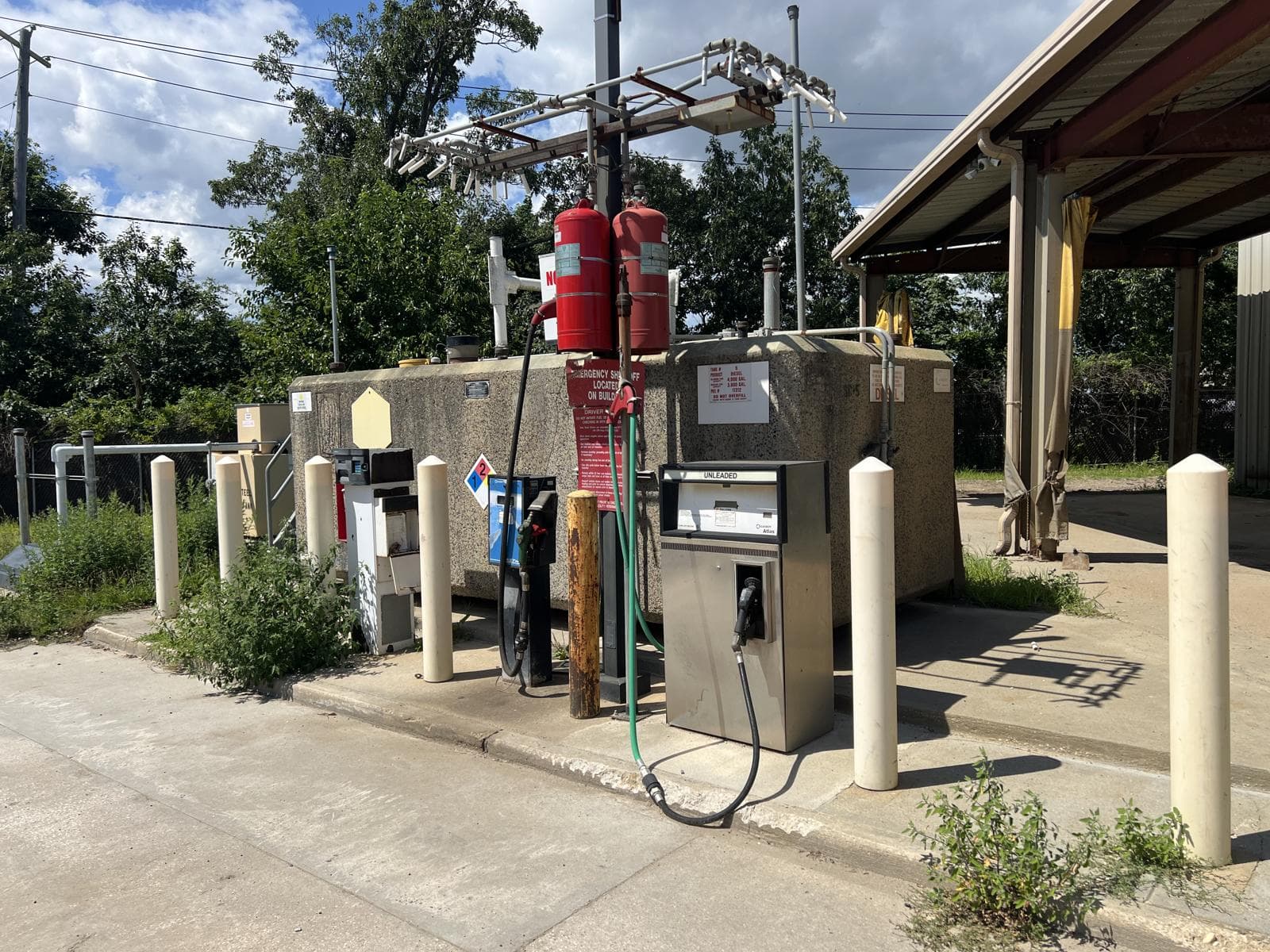 Existing outdoor tank and dispensing equipment documented during relocation planning
