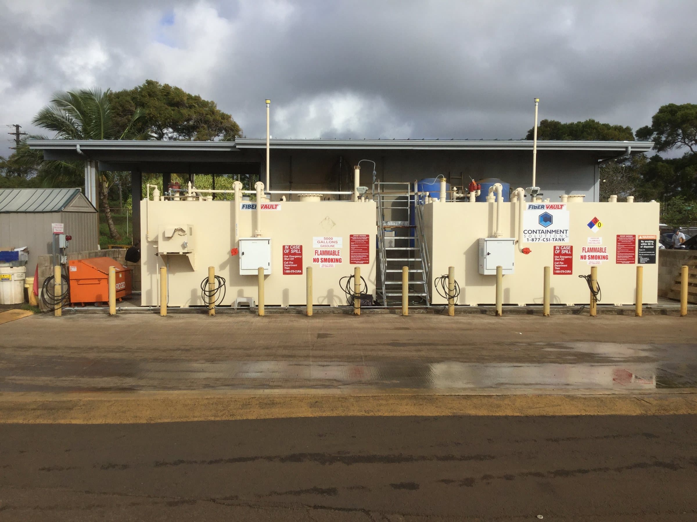 Two aboveground fuel tanks and access equipment.